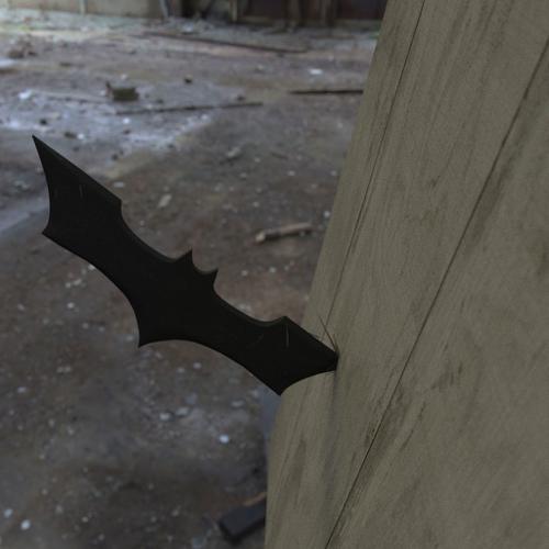 Batarang stuck in a wall