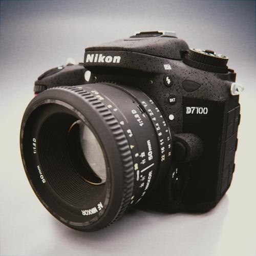 Nikon D7100 SLR Camera + Nikkor 50mm 1.8D Lens