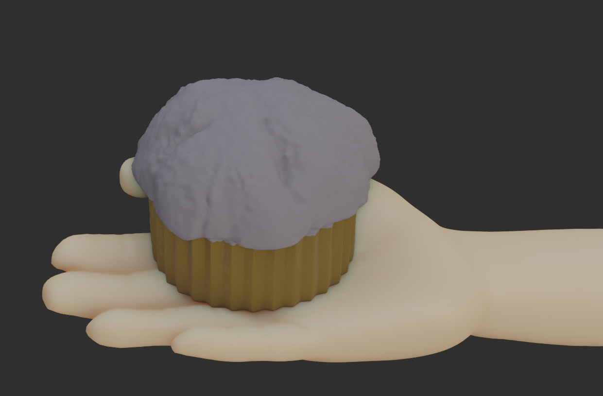 Hand holding Muffin